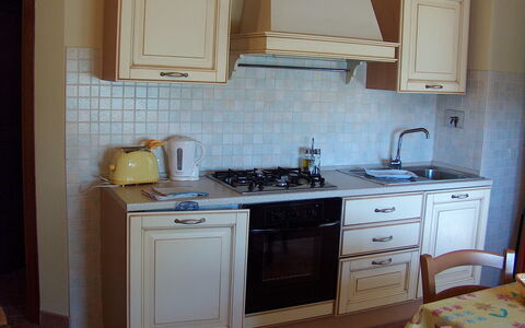 Bazzani Apartments In Siena: Cabinetry, Countertop, Møbel, Ejendom, Håndvask, Bygning, Tap, Blå, Køkken, Træ