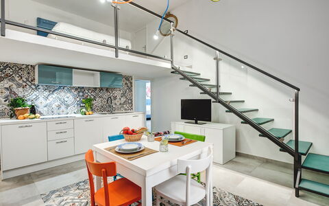 Loft In Sorrento: Møbel, Cabinetry, Ejendom, Countertop, Bord, Køkken, Orange, Belysning, Indretning, Stol