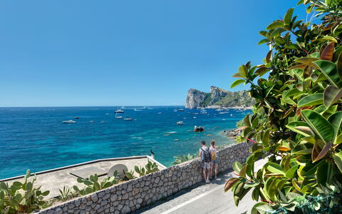 La Baia Dello Chalet: Vand, Himmel, Plante, Azure, Coastal Og Oceaniske Landskabsformer, Arecales, Strand, Fritid, Landskab