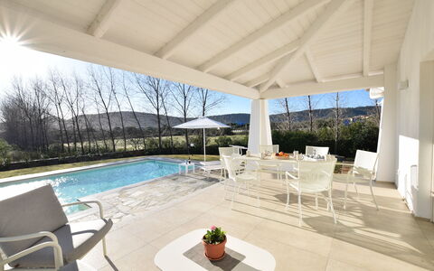 Villa Helios - Budoni, Sardegna: Plante, Vand, Ejendom, Møbel, Himmel, Bord, Skygge, Indretning, Arkitektur, Svømmepøl