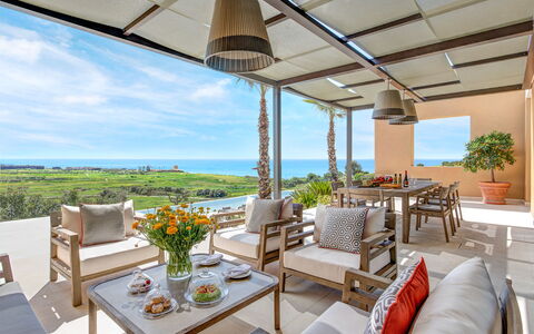 Villa Corallo - Sea Front | By Rocco Forte Villas: Bord, Plante, Himmel, Møbel, Ejendom, Blomsterkrukke, Stol, Azure, Stueplante, Skygge