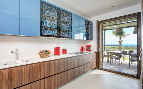 Villa Topazio - Sea View | By Rocco Forte Villas: Vindue, Møbel, Cabinetry, Plante, Bygning, Countertop, Indretning, Tap, Træ, Håndvask