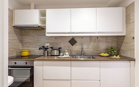 Suite Trastevere: Køkken, Countertop, Køkken Apparat, Cabinetry, Møbel, Indretning, Større Bandage, Gulvbelægning, Træ, Husholdningsapparat