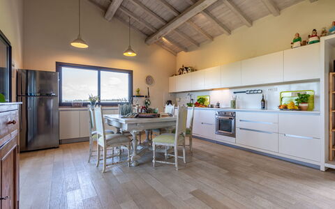 Villa Flaminia: Møbel, Indretning, Gulvbelægning, Køkken, Countertop, Træ, Loft, Etage, Cabinetry, Værelse