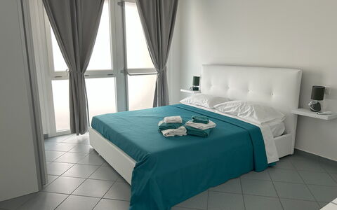 Case Martorelli - Belvedere Marittimo: Møbel, Etage, Gulvbelægning, Indretning, Værelse, Soveværelse, Seng, Sengetøj, Stol, Bed Frame
