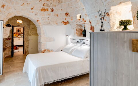 Trulli di Luccio: Lejlighed, Soveværelse, Loft, Sengetøj, Stenmur, Seng, Bed Frame, Sengetøj, Sengetøj, Pude