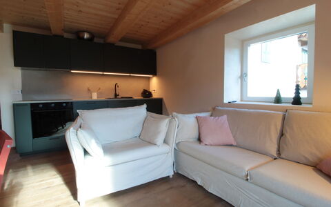Casa Tomà Mountain View Cortina: Møbel, Gulvbelægning, Indretning, Etage, Couch, Træ, Værelse, Trægulve, Stue, Bord
