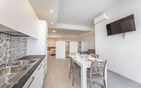 Appartamento Monomare, Gallipoli: Gulvbelægning, Etage, Indretning, Loft, Countertop, Køkken, Værelse, Lejlighed, Større Bandage, Trægulve