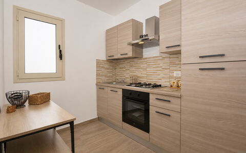 Villa Cosentini: Større Bandage, Træ, Køkken, Countertop, Køkken Apparat, Indretning, Gulvbelægning, Cabinetry, Lejlighed, Etage