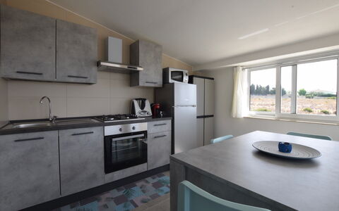Villa Giugiola: Countertop, Køkken, Møbel, Gulvbelægning, Etage, Indretning, Sanitærarmatur, Loft, Større Bandage, Håndvask