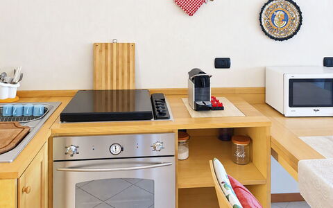 Coniglio Beach: Køkken, Køkken Apparat, Større Bandage, Træ, Møbel, Husholdningsapparat, Komfur, Countertop, Lille Apparat, Komfur