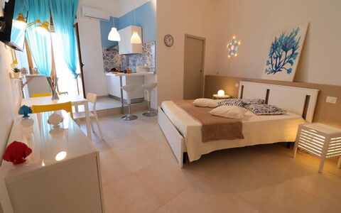 Casa Maya a Otranto: Møbel, Indretning, Gulvbelægning, Etage, Værelse, Loft, Soveværelse, Stol, Lejlighed, Seng