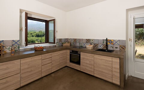 Villa Terre Normanne 10: Køkken, Indretning, Gulvbelægning, Træ, Countertop, Etage, Hjem, Møbel, Cabinetry, Værelse
