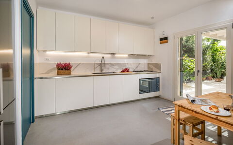Casavento Puzziteddu 6: Køkken, Countertop, Køkken Apparat, Indretning, Gulvbelægning, Større Bandage, Cabinetry, Træ, Møbel, Etage